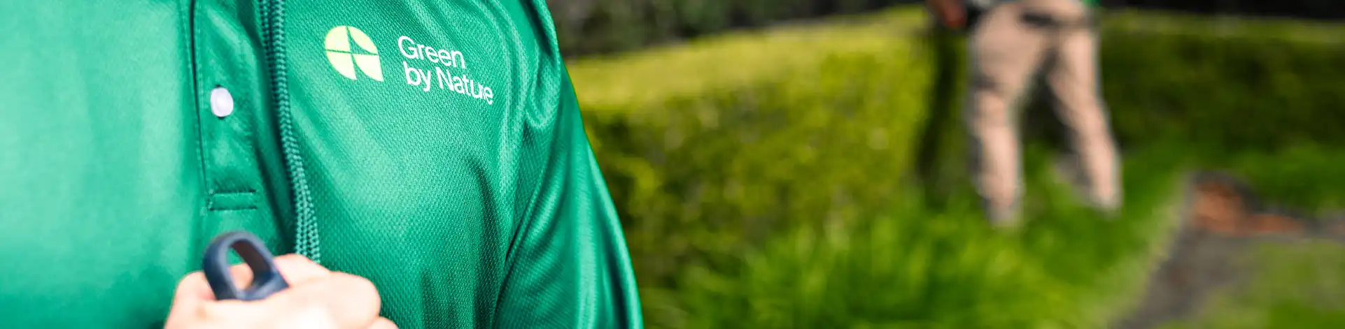 Green by Nature employee in t shirt - Banner image